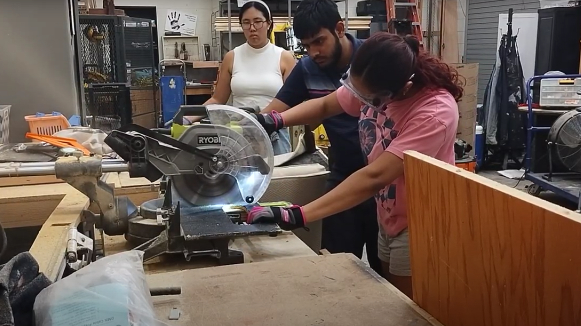 Seniors Rupal Shirpurkar, Hussain Qureshi, and Amanda Oh lead tech theatre 1 students by example. 
