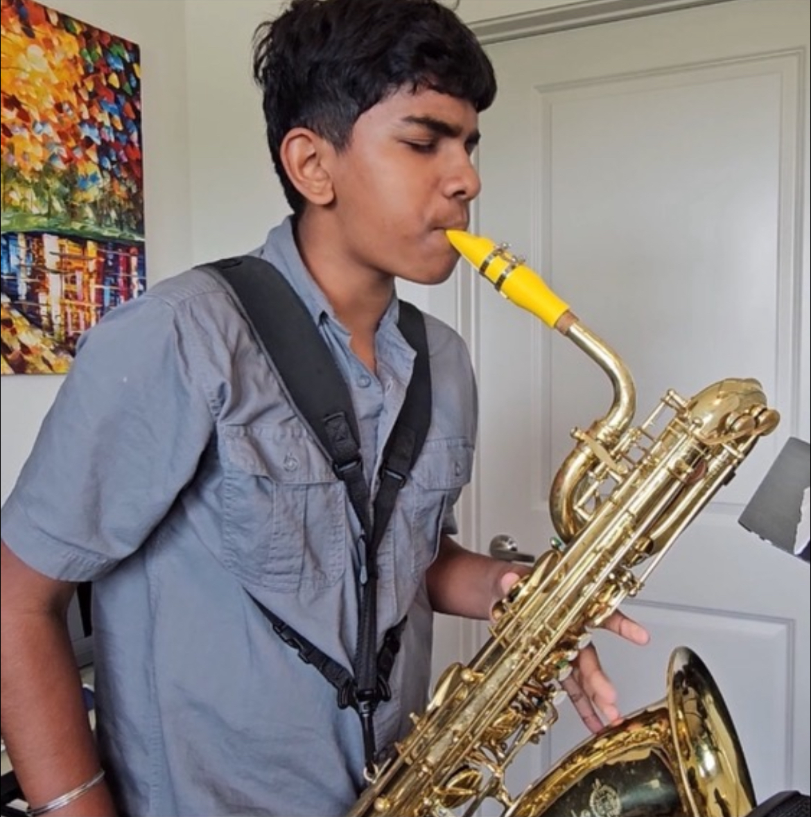 Pictured above, senior Noel Benny practices at home.