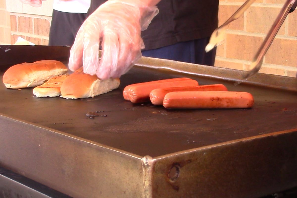 For teacher appreciation week, baseball organized a barbecue cookout for staff outside the cafeteria during all lunches on Wednesday with players and coaches preparing food and snacks to show their gratitude for staff members.