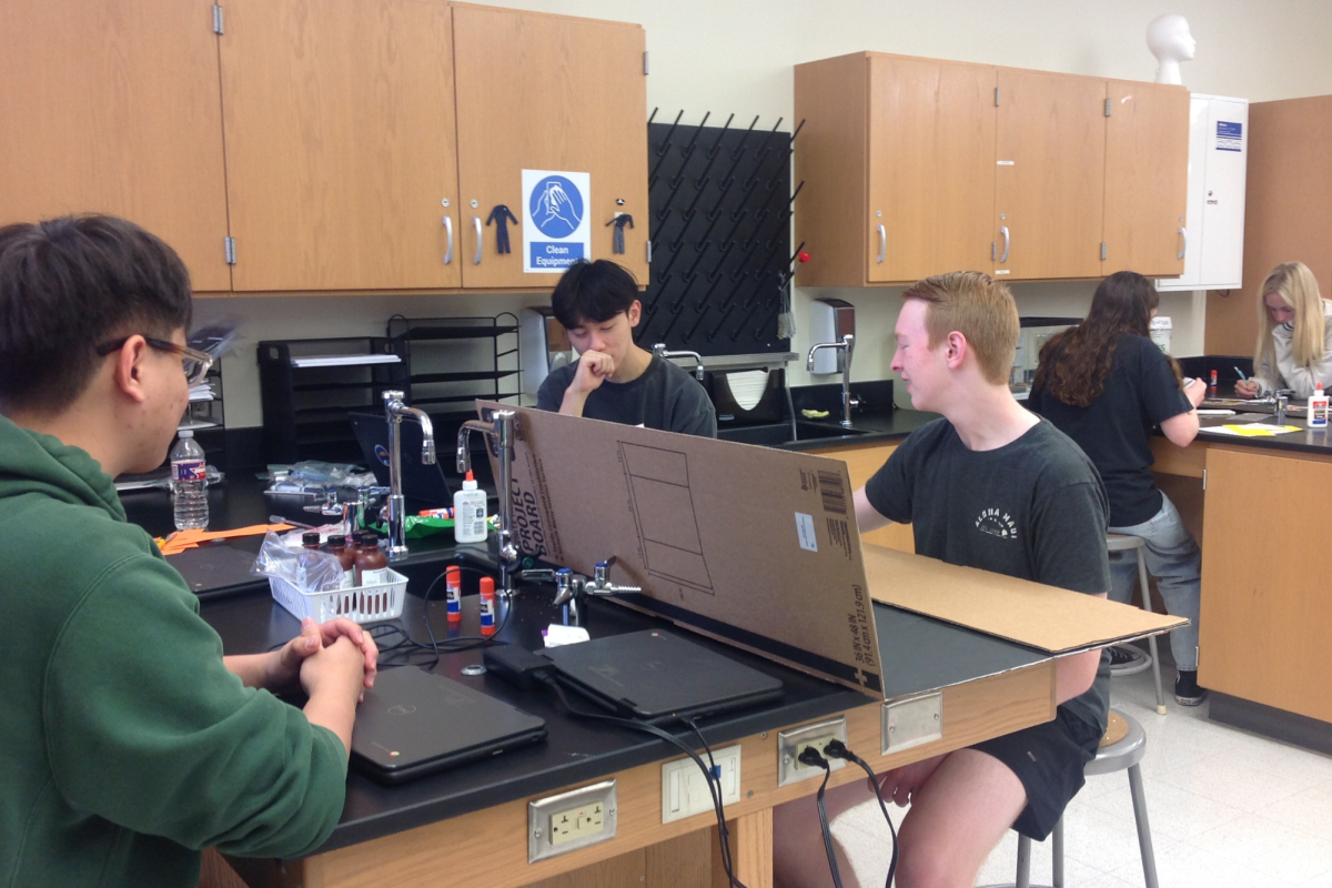 Students in CTE Forensic Science work together on a group project.