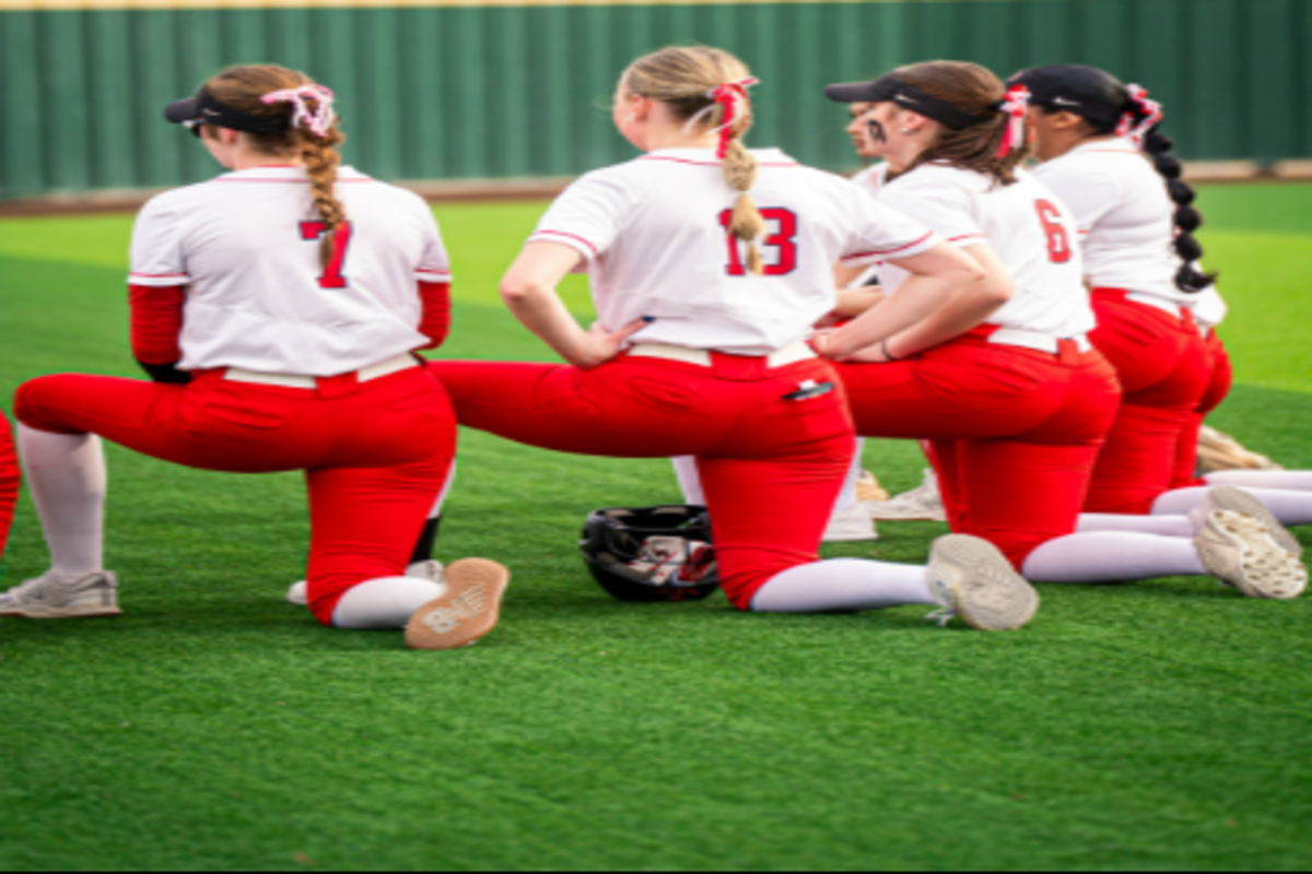 L-R senior utility player Sam Byrnes, senior pitcher/utility player Addison Hanson and sophomore utility player Greer Schurr